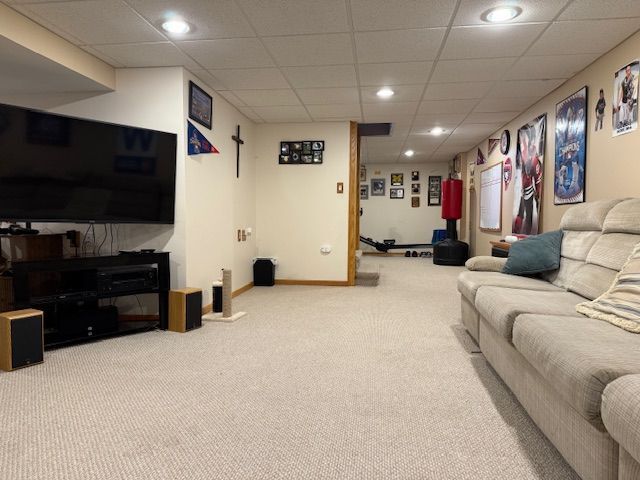 1201 East Street Crete, IL 60417 - Photo 43 of 45 a living room with furniture and a flat screen tv