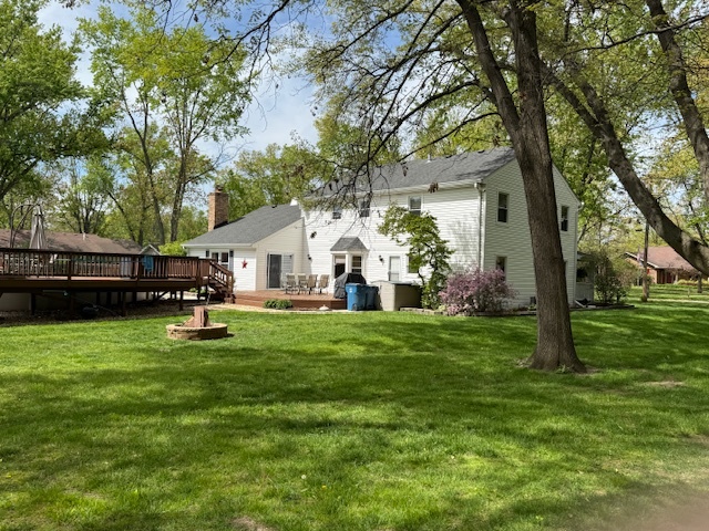 1201 East Street Crete, IL 60417 - Photo 6 of 45 a house view with a garden space