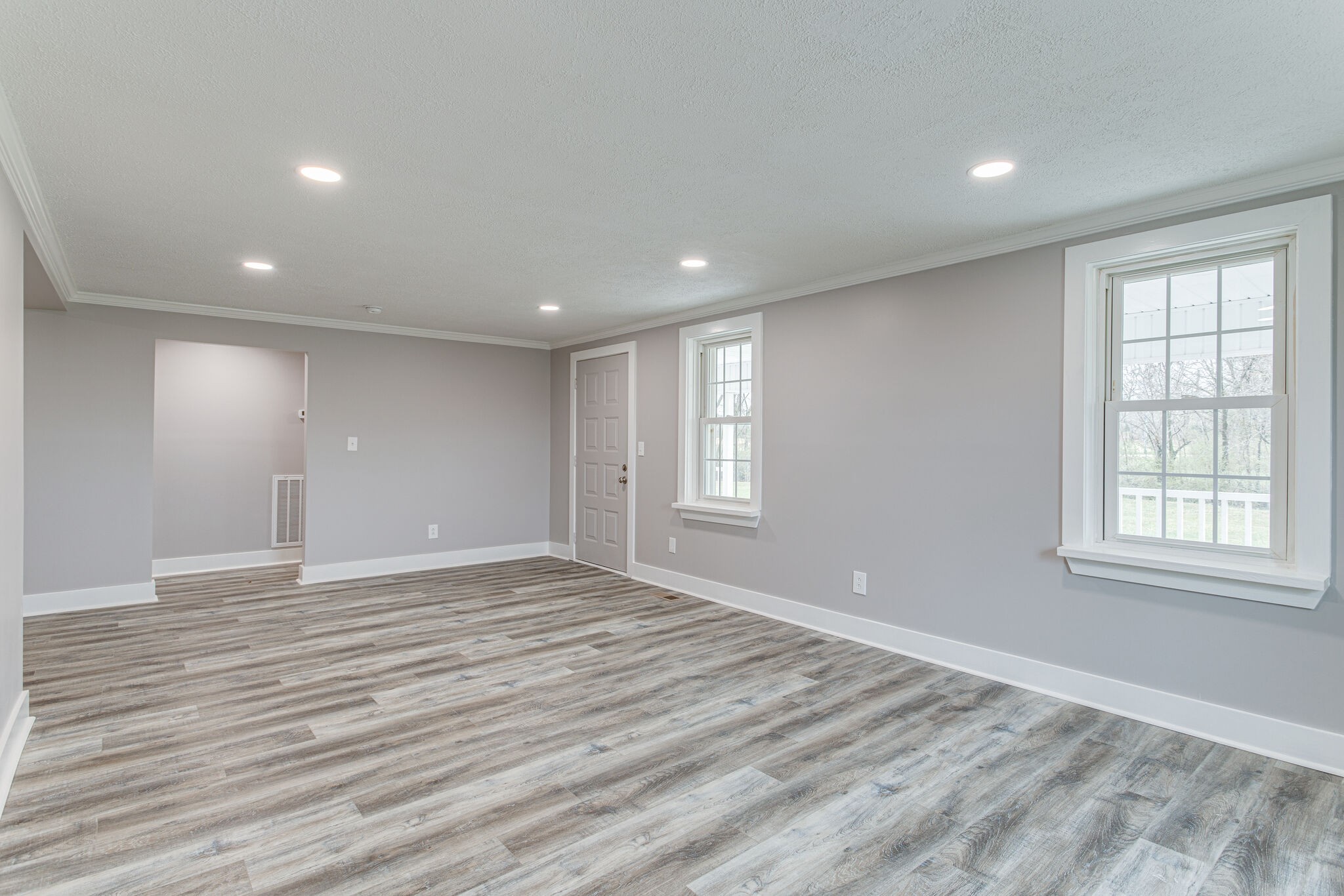 1466 Bible Crossing Road Winchester, TN 37398 - Photo 11 of 31 a view of empty room with wooden floor and fan