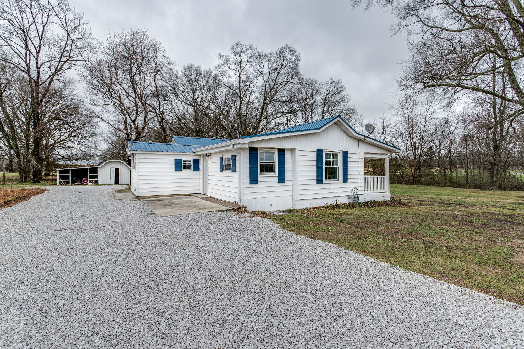 1466 Bible Crossing Road Winchester, TN 37398 - Photo 2 of 31 a view of a house with a yard and large tree