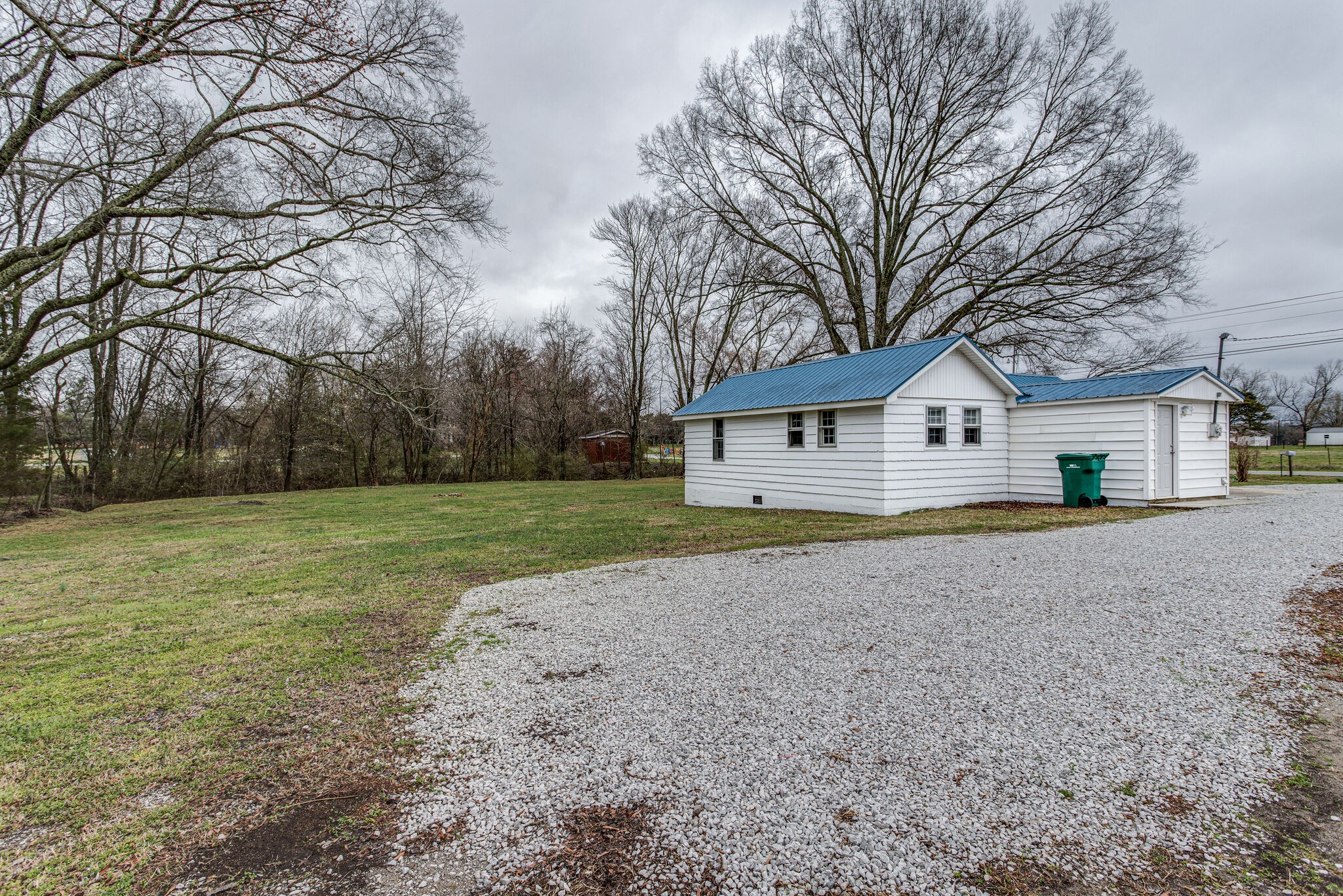 1466 Bible Crossing Road Winchester, TN 37398 - Photo 29 of 31 a front view of house with yard and trees