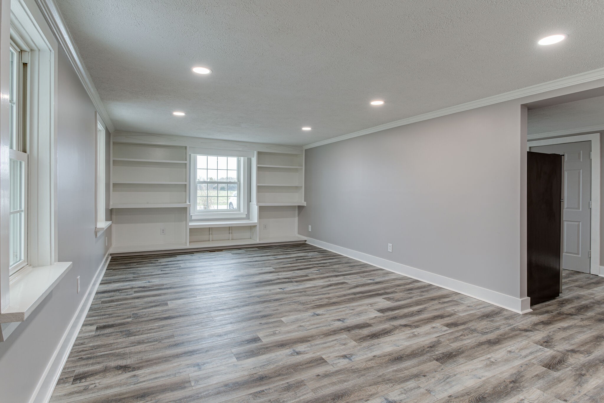 1466 Bible Crossing Road Winchester, TN 37398 - Photo 7 of 31 wooden floor in an empty room with a window