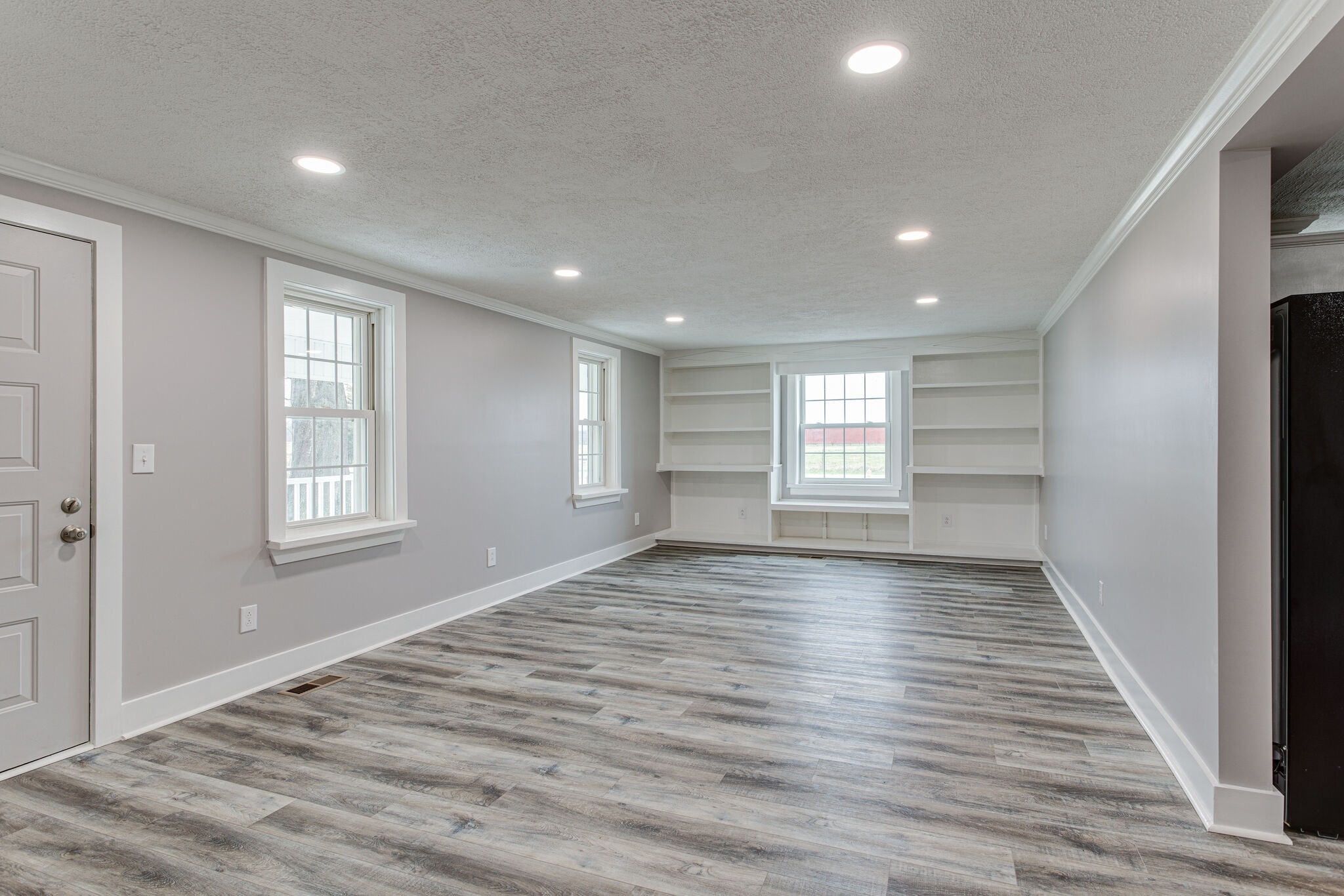1466 Bible Crossing Road Winchester, TN 37398 - Photo 8 of 31 a view of empty room with wooden floor and fan