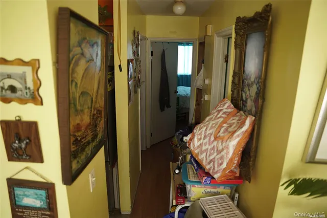 a bedroom with a bed and a mirror