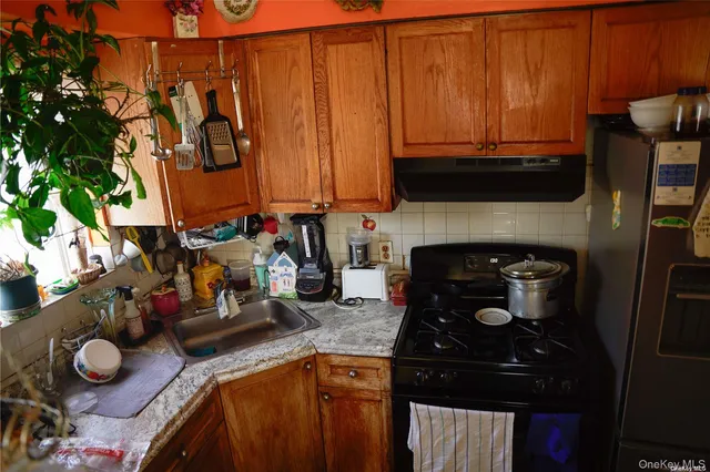 a room with furniture and a lamp