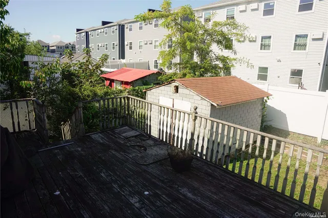 a view of a house with iron stairs