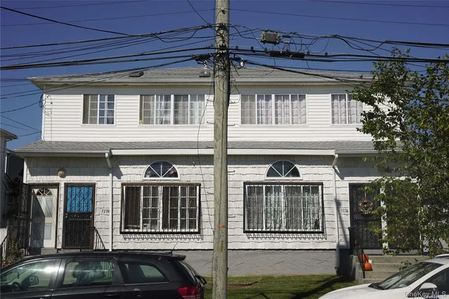 a view of a house with a porch