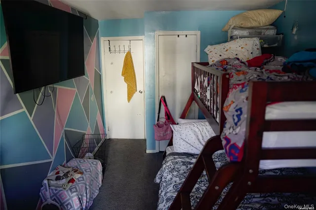 a bed room with a bed and a couch