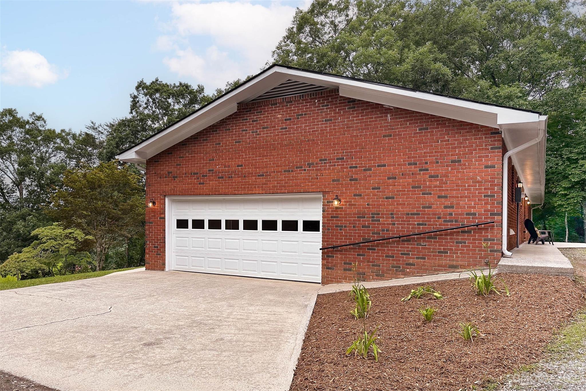 49 Community Road Fletcher, NC 28732 - Photo 34 of 38 a view of a house with a yard