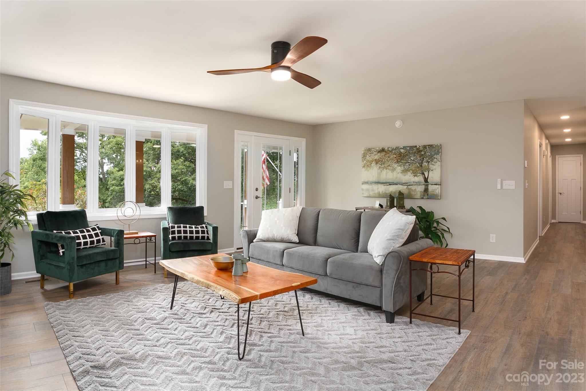 49 Community Road Fletcher, NC 28732 - Photo 5 of 38 a living room with furniture and a large window