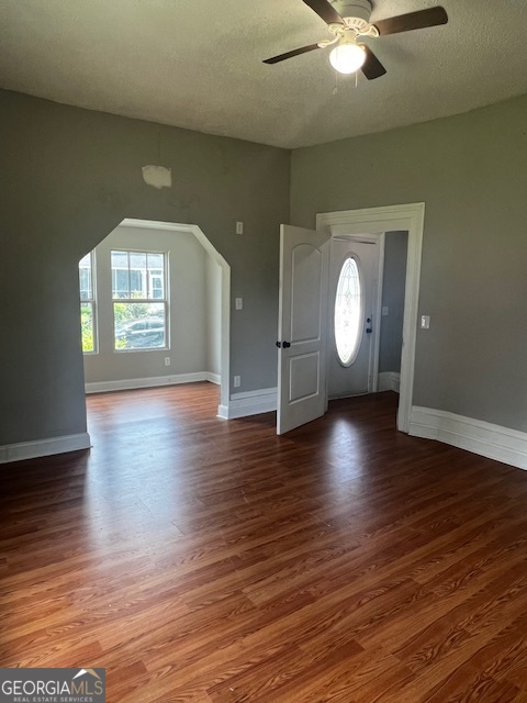 2033 3rd Avenue Macon, GA 31204 - Photo 3 of 12 an empty room with wooden floor and windows
