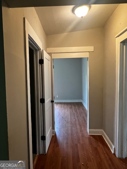 2033 3rd Avenue Macon, GA 31204 - Photo 6 of 12 a view of a hallway with wooden floor and closet