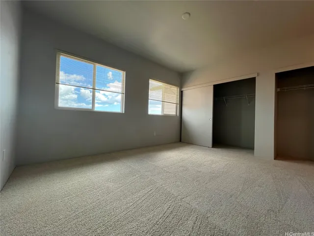 an empty room with windows