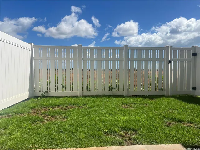 a view of a porch with a yard
