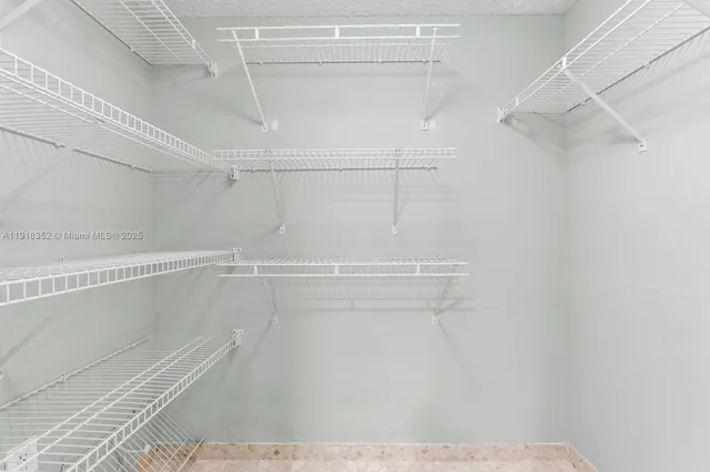 a view of a room with racks on the wall