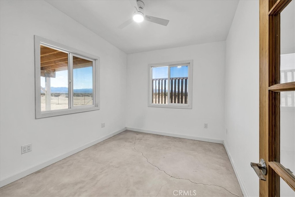 86515 Amboy Road Twentynine Palms, CA 92277 - Photo 12 of 34 an empty room with windows