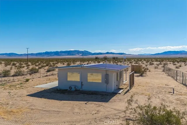 a view of a ocean with a mountain