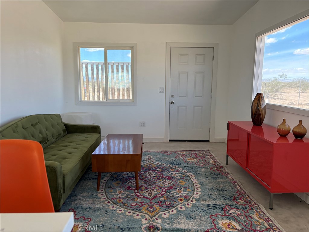 86515 Amboy Road Twentynine Palms, CA 92277 - Photo 4 of 34 a living room with furniture and a window