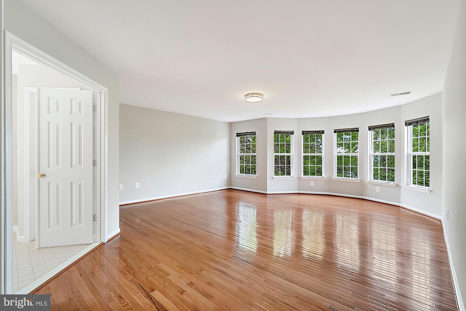4175 Bell Ridge Court Chantilly, VA 20151 - Photo 22 of 48 a view of empty room with wooden floor and fan