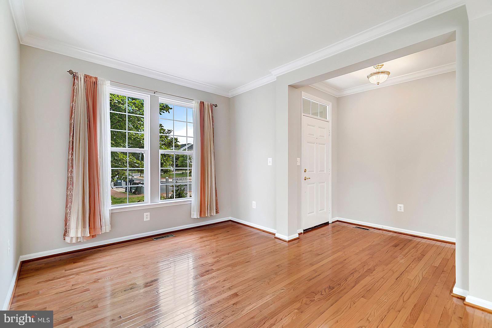 4175 Bell Ridge Court Chantilly, VA 20151 - Photo 3 of 48 a view of an empty room with wooden floor and a window