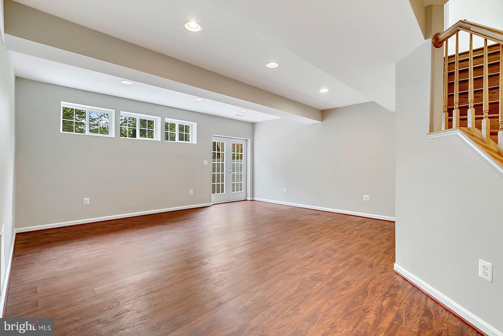 4175 Bell Ridge Court Chantilly, VA 20151 - Photo 36 of 48 a view of an empty room with wooden floor and a window