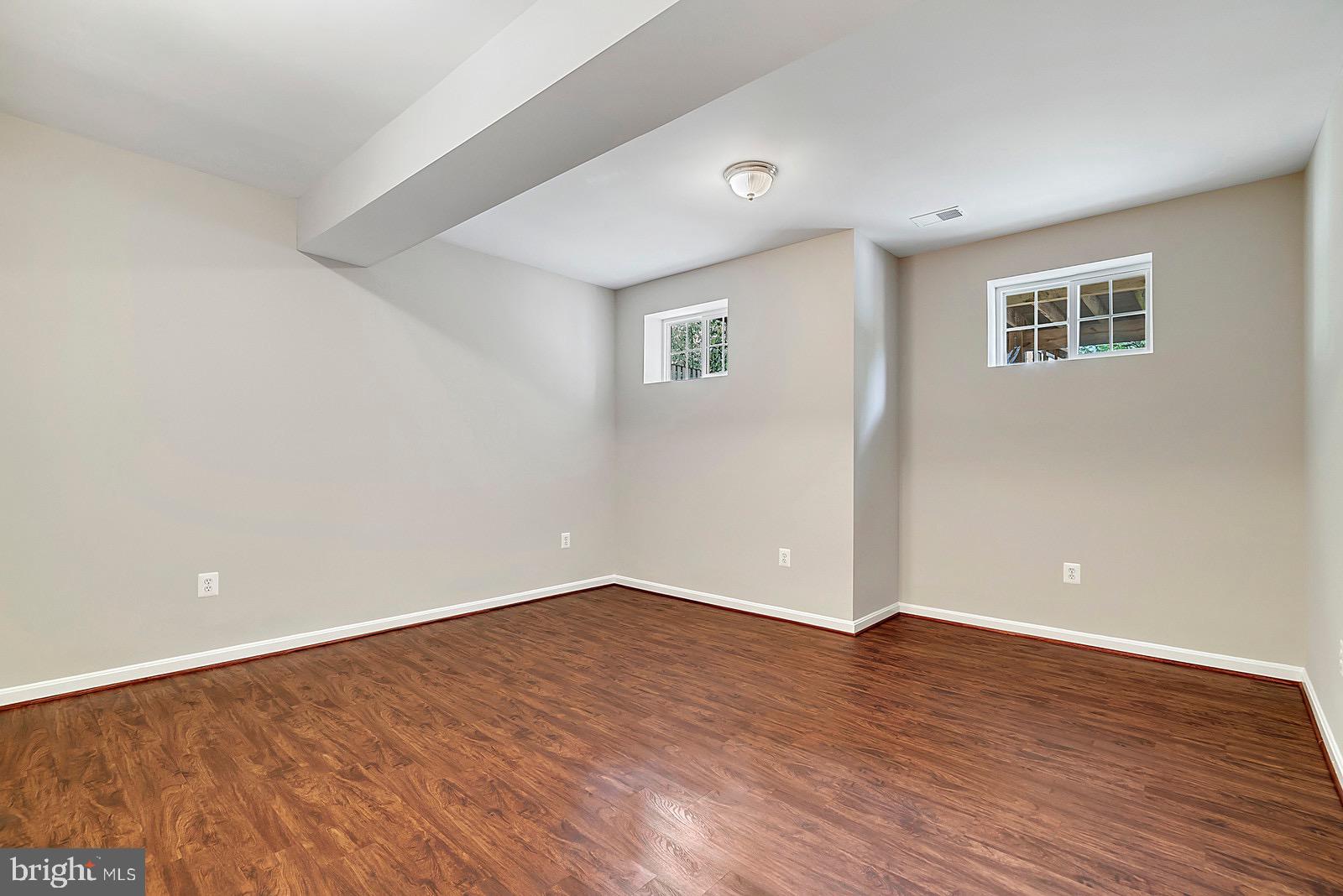 4175 Bell Ridge Court Chantilly, VA 20151 - Photo 39 of 48 a view of an empty room with wooden floor