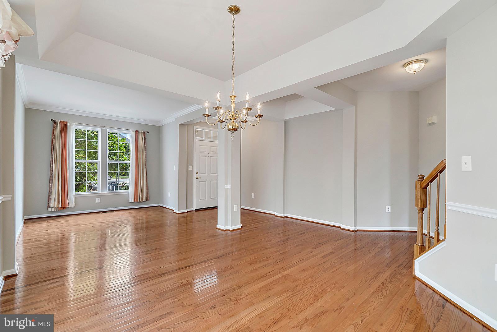 4175 Bell Ridge Court Chantilly, VA 20151 - Photo 6 of 48 a view of an empty room with wooden floor and a window