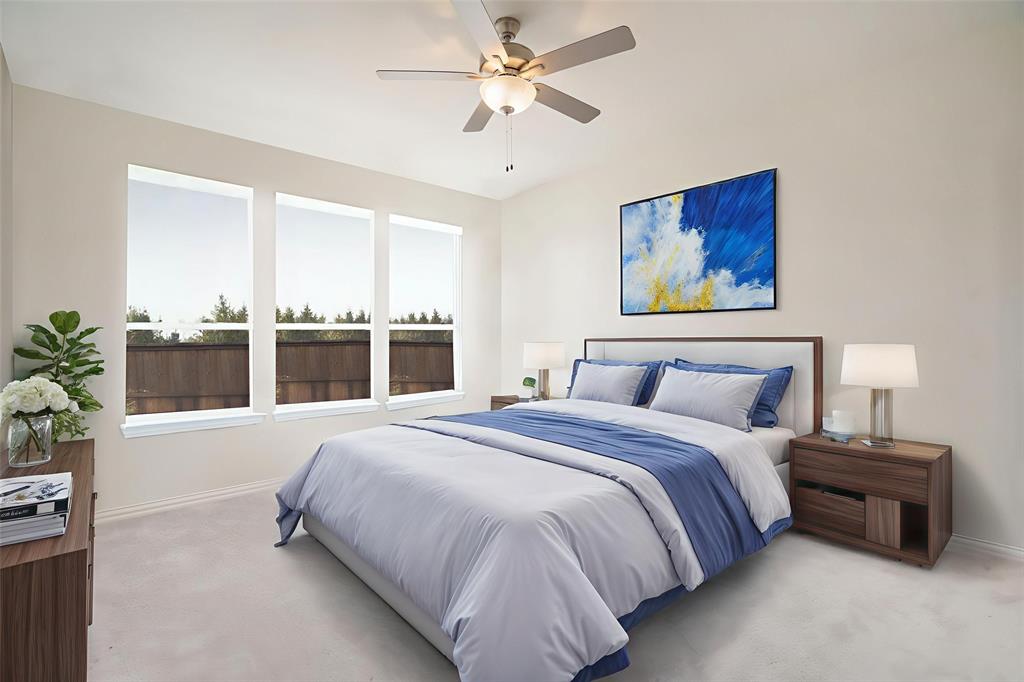 6049 Iron Creek Road Fort Worth, TX 76137 - Photo 16 of 30 a bedroom with a bed painting on wall and a large window