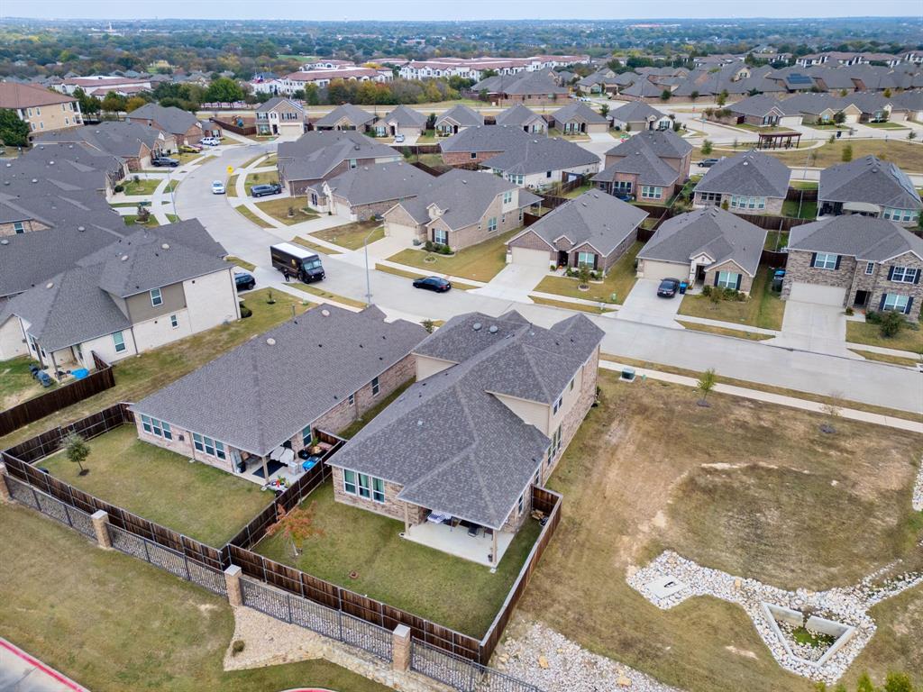 6049 Iron Creek Road Fort Worth, TX 76137 - Photo 26 of 30 an aerial view of residential houses with outdoor space