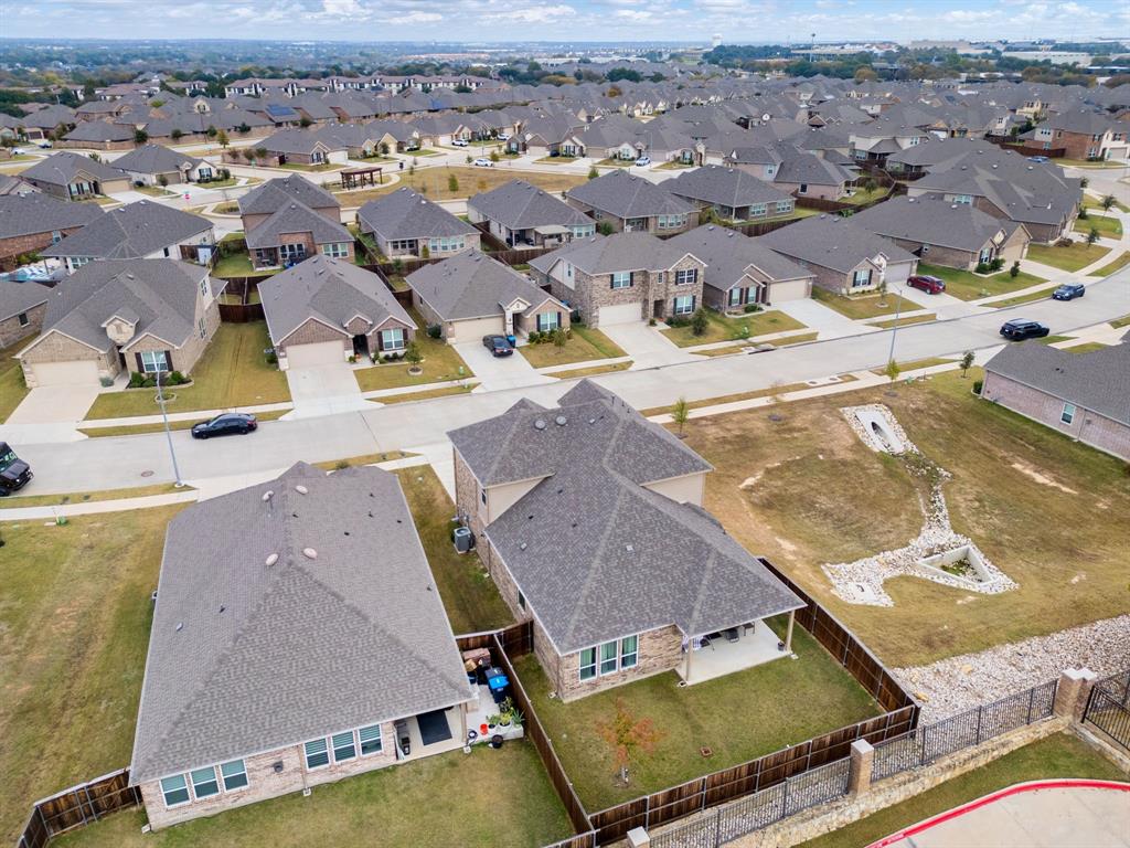 6049 Iron Creek Road Fort Worth, TX 76137 - Photo 27 of 30 an aerial view of residential houses with outdoor space