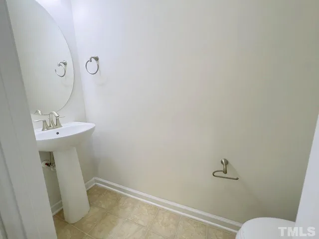 a bathroom with a sink and toilet