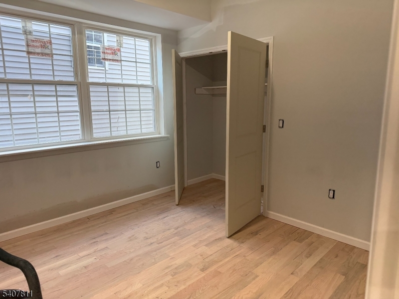 357 South 11th Street, Unit 3 Newark, NJ 07103 - Photo 9 of 13 an empty room with a natural light