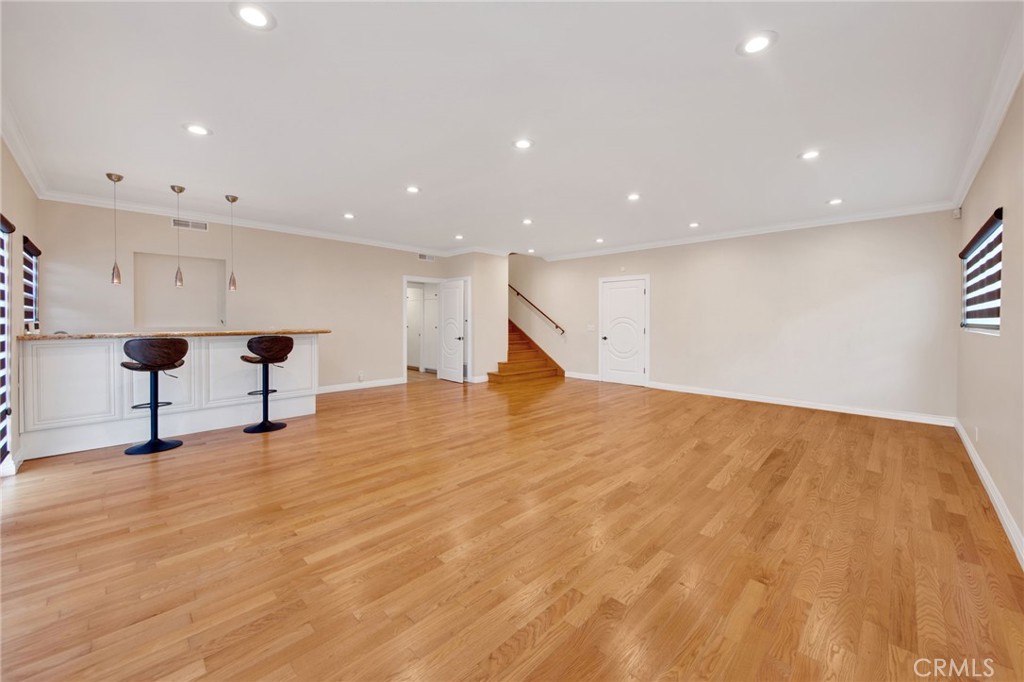 1259 Swarthmore Drive Glendale, CA 91206 - Photo 14 of 33 a view of empty room with wooden floor