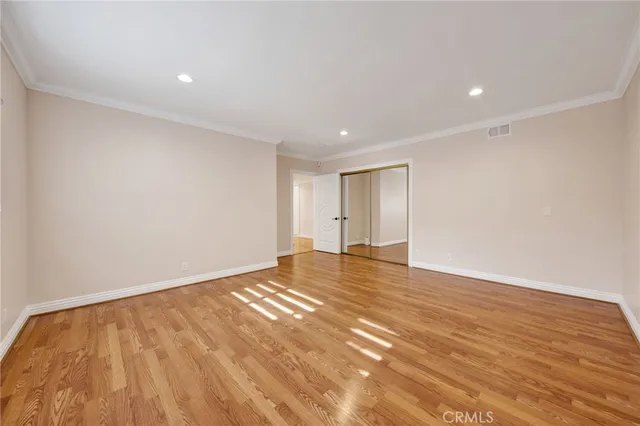 a view of room and wooden floor