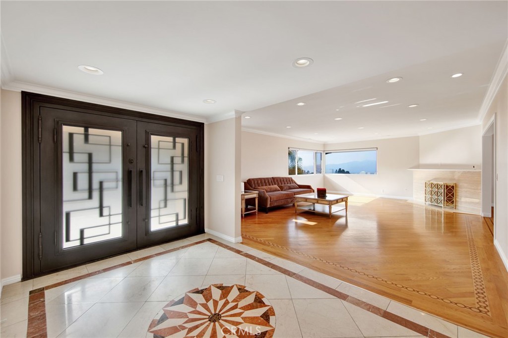 1259 Swarthmore Drive Glendale, CA 91206 - Photo 5 of 33 a living room with furniture and a large window