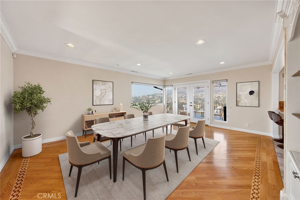 1259 Swarthmore Drive Glendale, CA 91206 - Photo 9 of 33 a view of a dining room with furniture and wooden floor