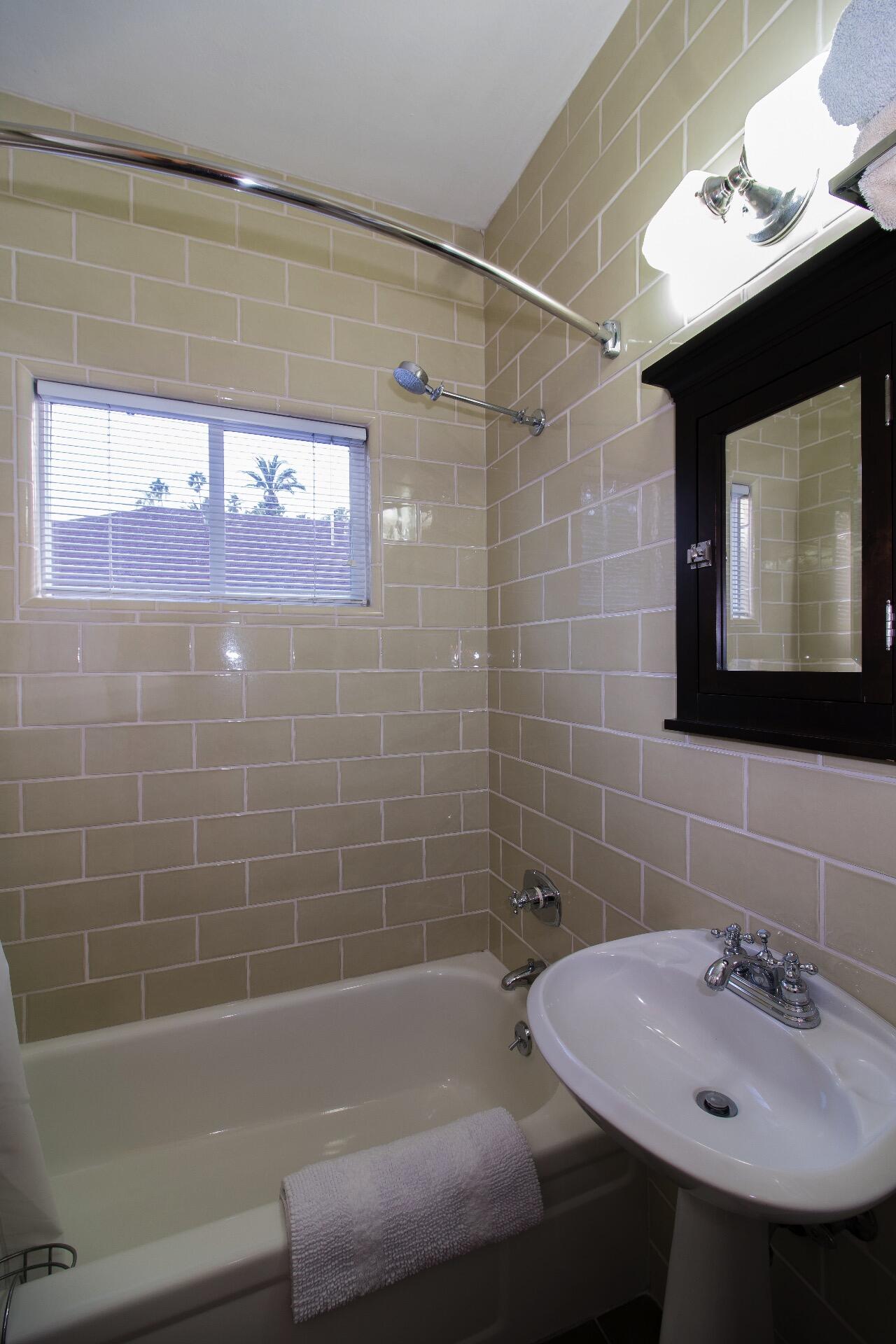 Undisclosed Address Santa Barbara, CA 93101 - Photo 15 of 24 a bathroom with a sink shower and a bathtub