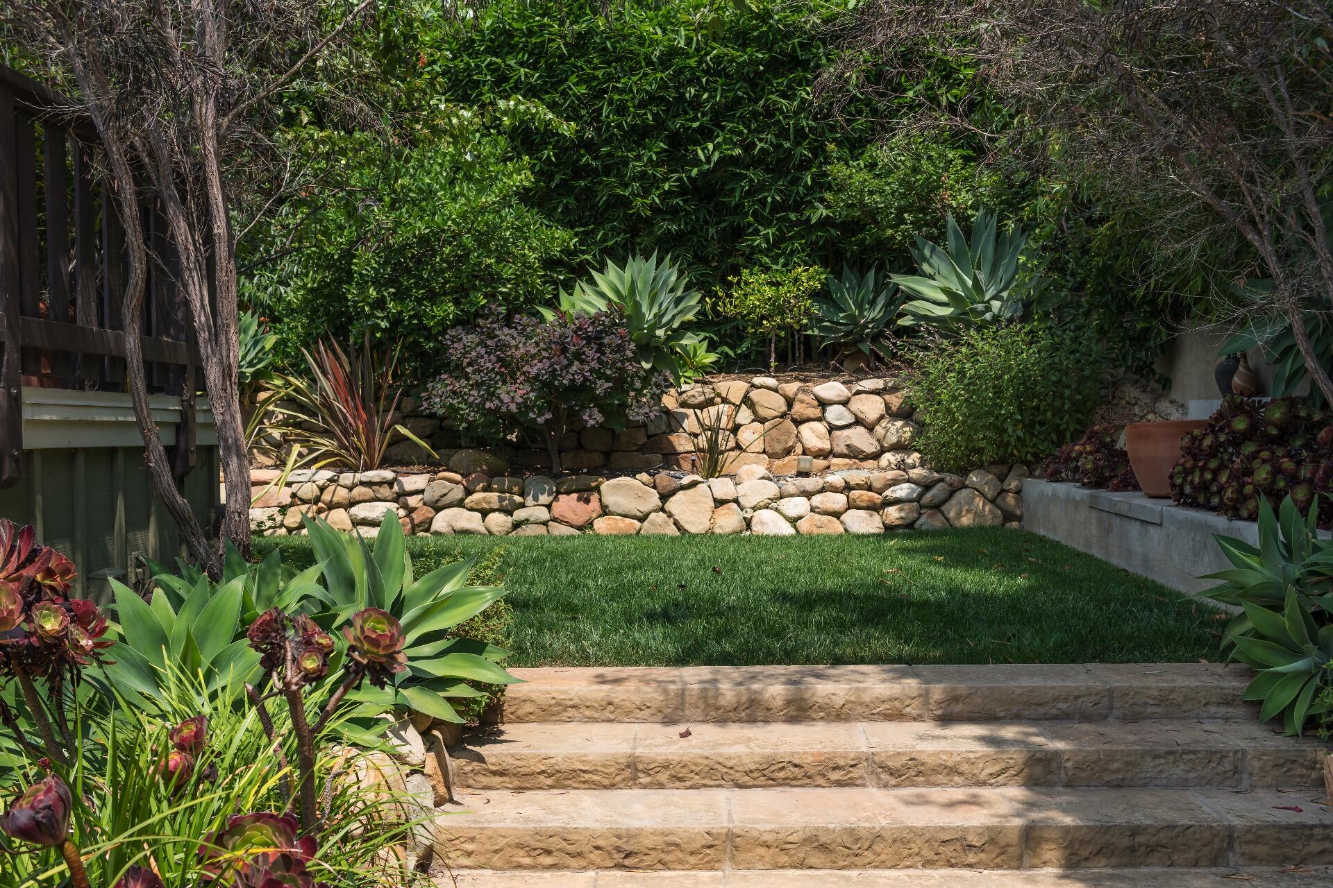 Undisclosed Address Santa Barbara, CA 93101 - Photo 21 of 24 a backyard of a house with lots of green space