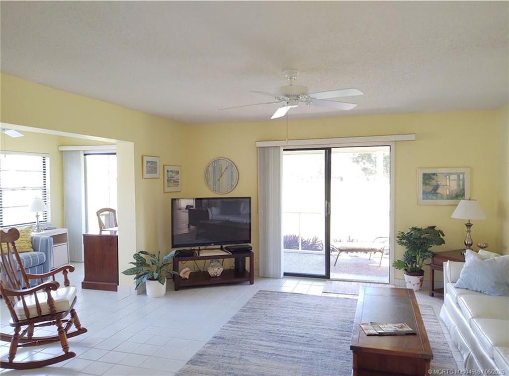 Undisclosed Address Stuart, FL 34997 - Photo 16 of 81 a living room with furniture and a flat screen tv