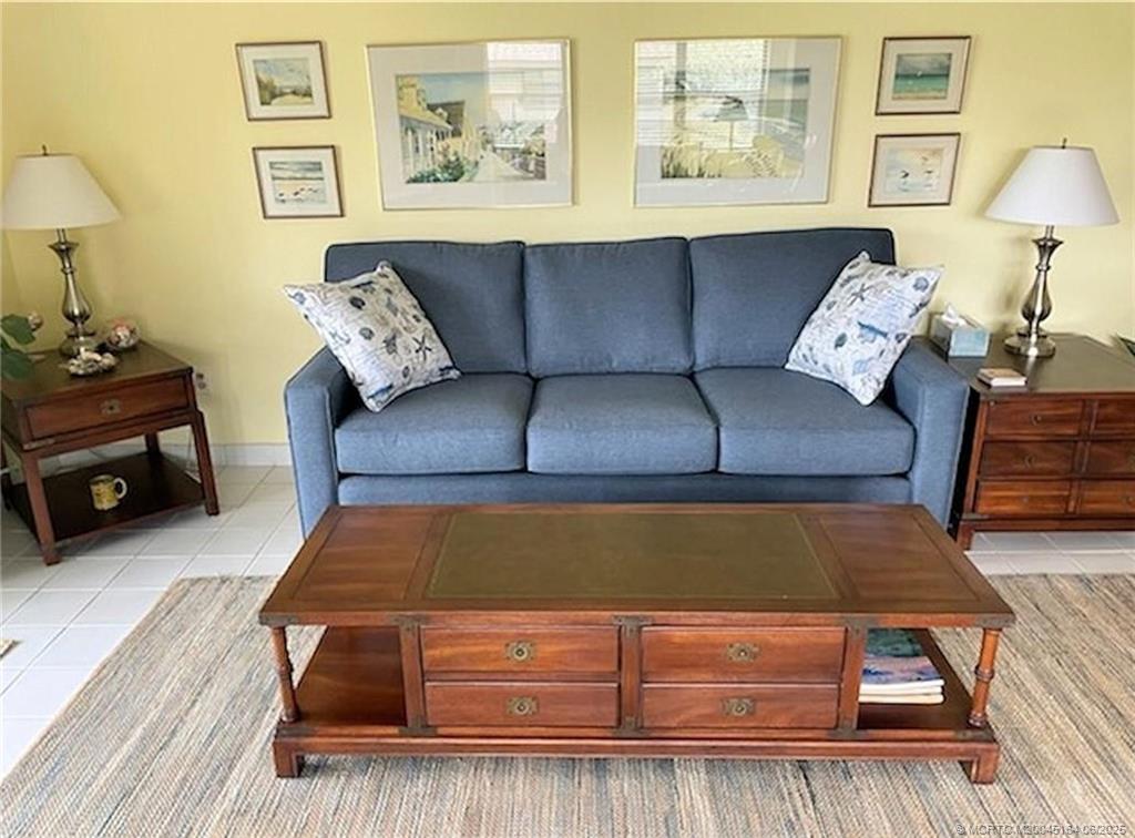 Undisclosed Address Stuart, FL 34997 - Photo 18 of 81 a living room with furniture and a window