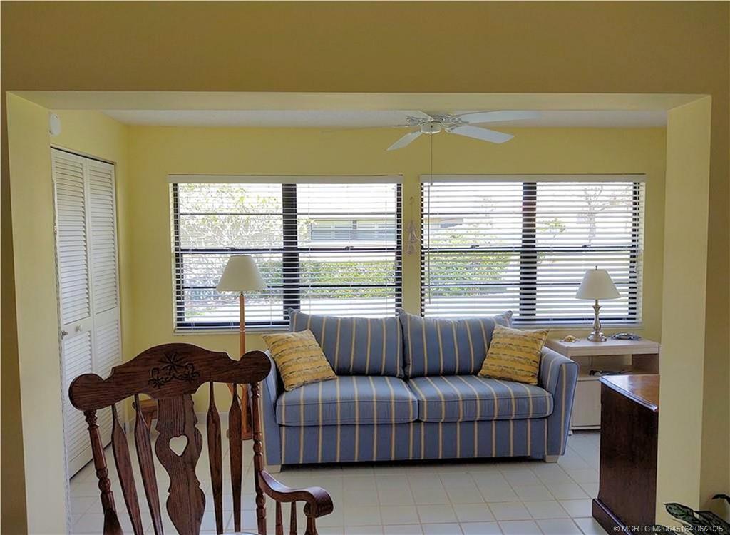 Undisclosed Address Stuart, FL 34997 - Photo 21 of 81 a living room with furniture and a large window