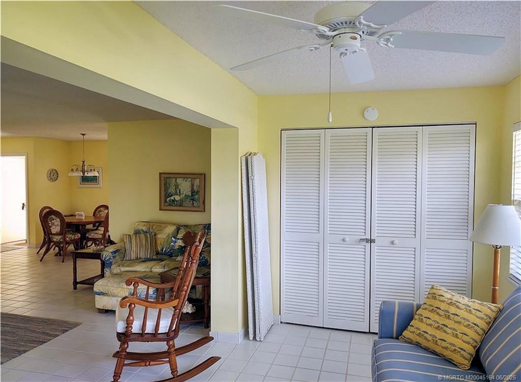 Undisclosed Address Stuart, FL 34997 - Photo 22 of 81 a living room with furniture and wooden floor