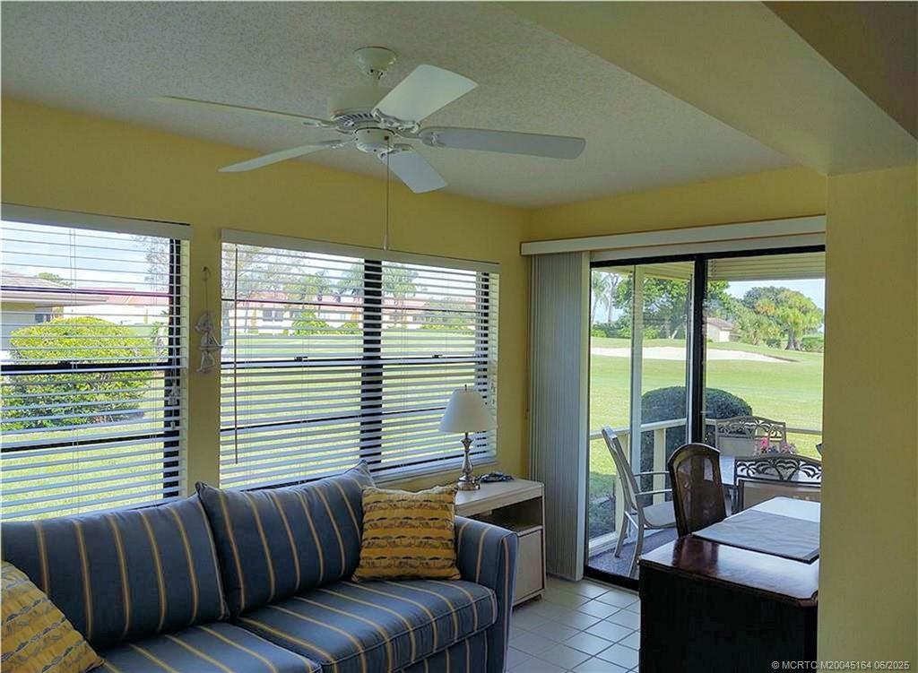 Undisclosed Address Stuart, FL 34997 - Photo 24 of 81 a living room with furniture and a large window