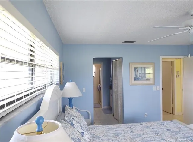 a bathroom with a shower and a mirror