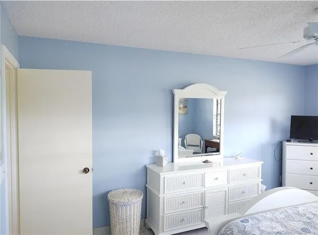 a en suite bathroom with a sink a mirror and a shower