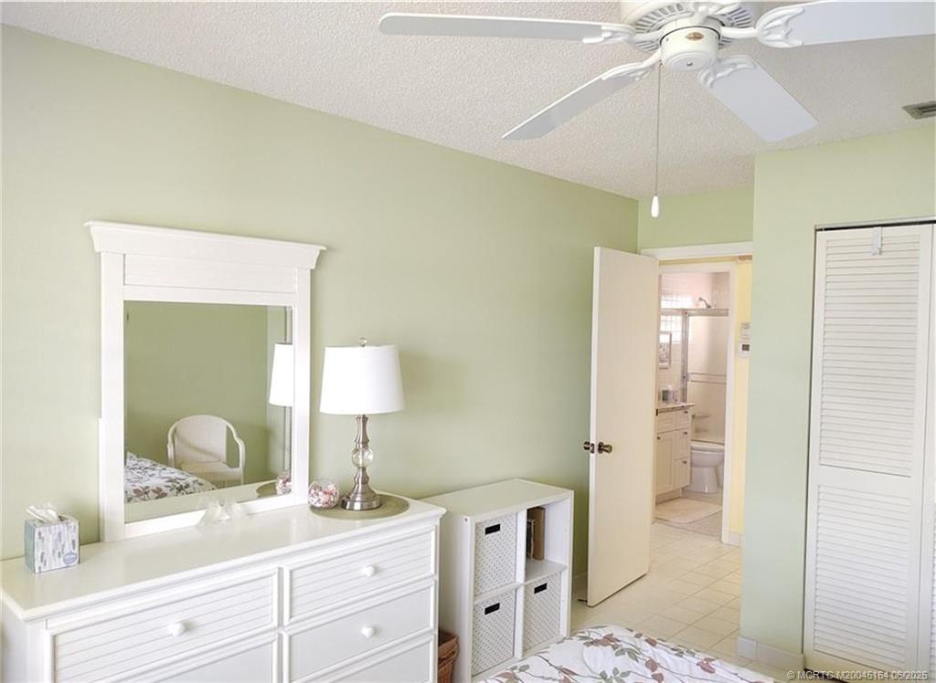 Undisclosed Address Stuart, FL 34997 - Photo 47 of 81 a en suite bathroom with a sink a mirror and a shower