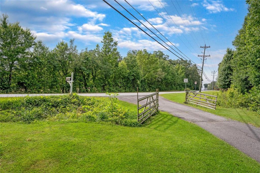 5364 Post Road Cumming, GA 30040 - Photo 4 of 12 a view of a park with large trees