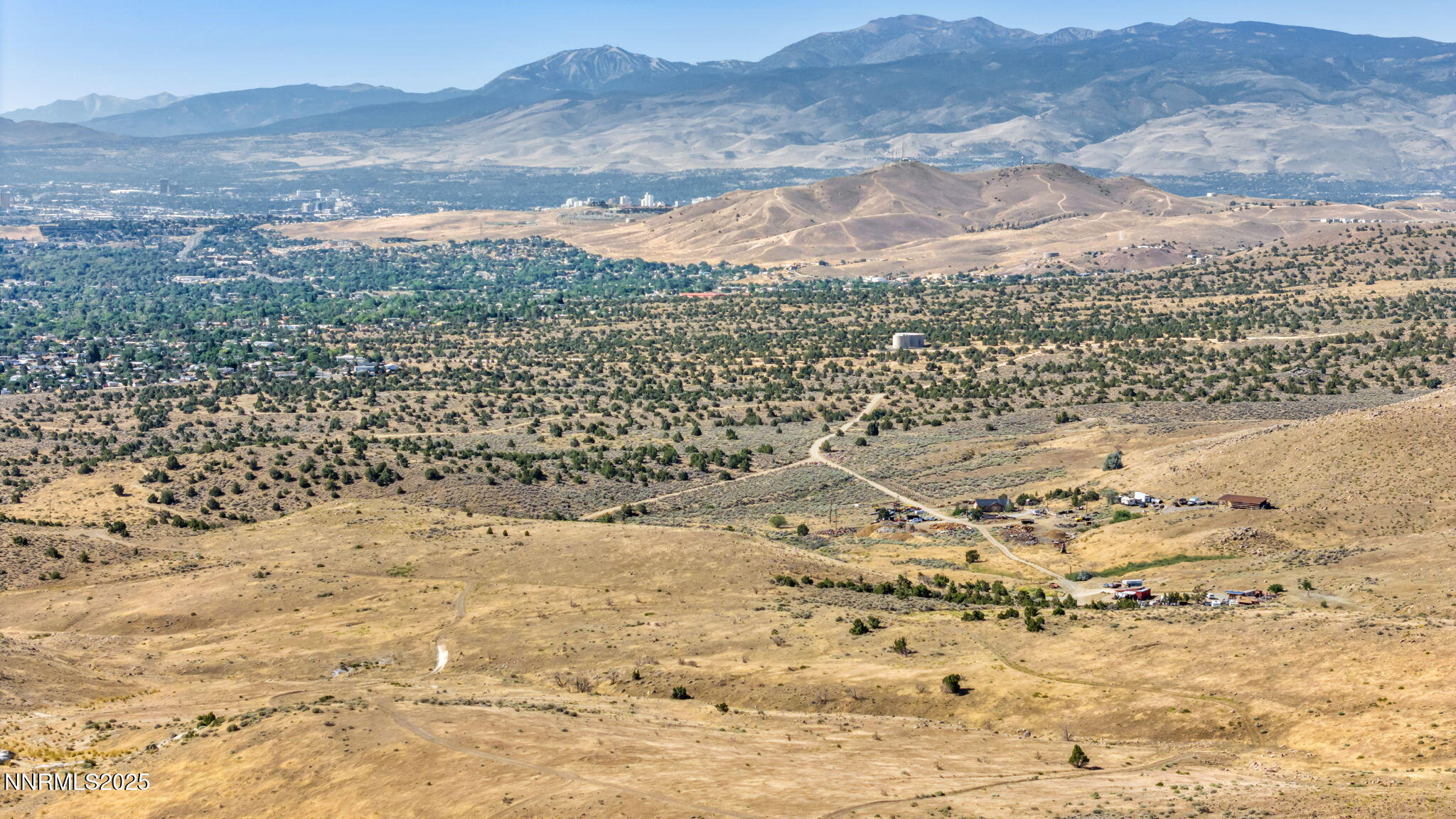 a view of a city with a mountain