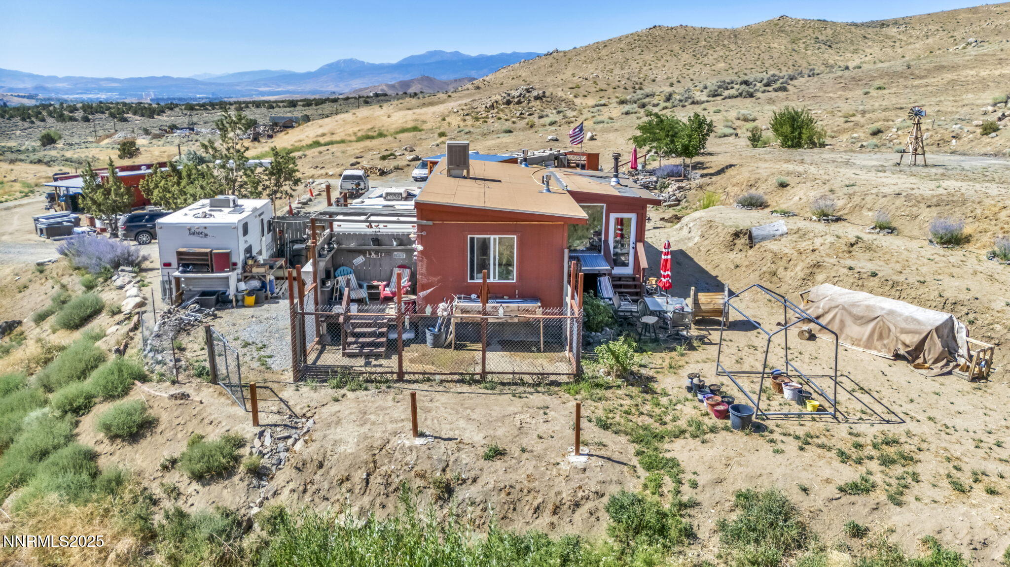 8560 Chimney Road, Unit GOOGLE MAPS IS NOT ACCURATE Sparks, NV 89436 - Photo 19 of 46 an aerial view of a house with a mountain