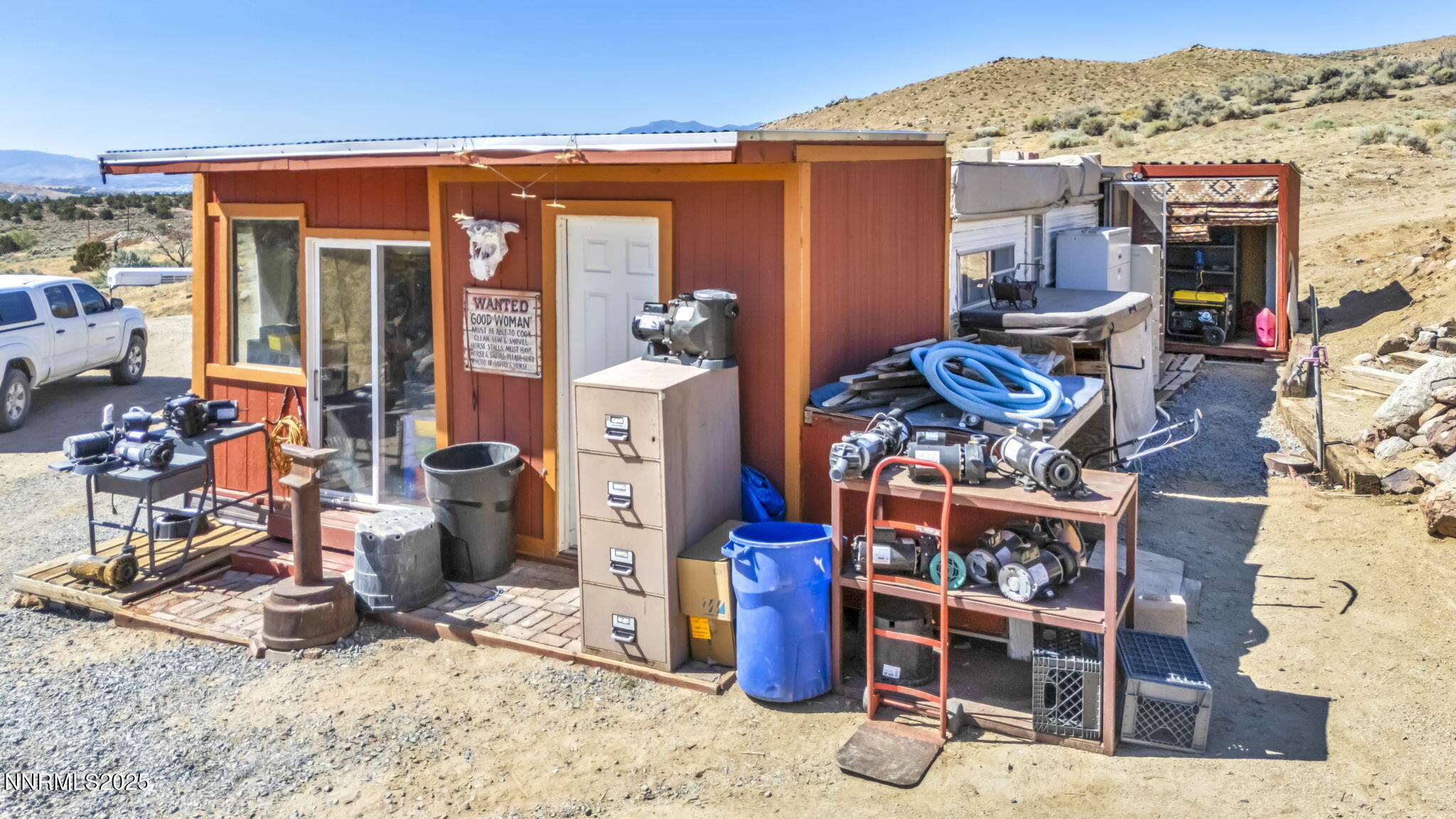 8560 Chimney Road, Unit GOOGLE MAPS IS NOT ACCURATE Sparks, NV 89436 - Photo 23 of 46 a view of a chairs and tables in patio